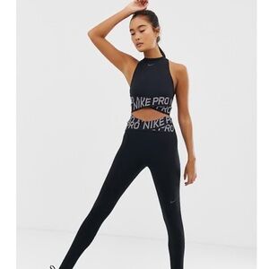 NIKE TRAINING CROSS OVER INTERTWIST LEGGINGS/ SIZE M